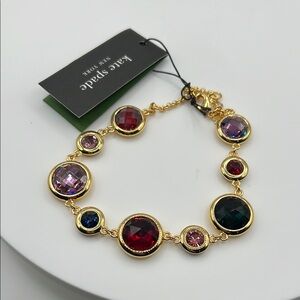 293. Kate Spade Gold‎ Bracelet with Red and Purple Gems